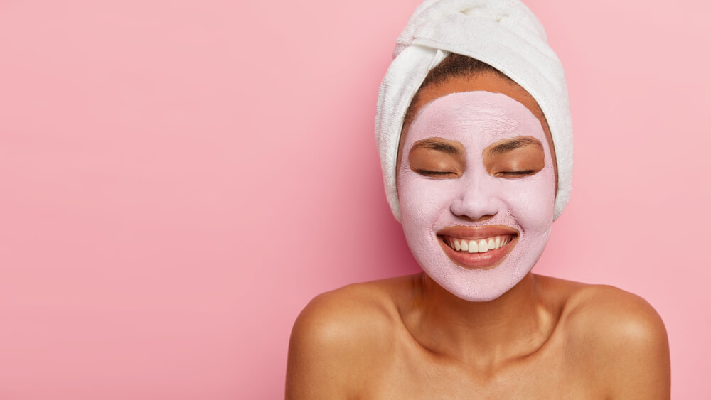 Woman with clay mask