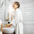 Woman at sink in bathroom