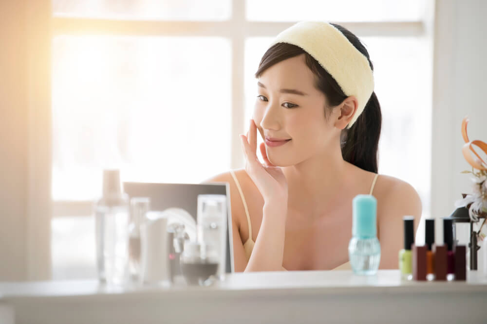 Woman looking at skincare products