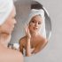 Woman applying face cream