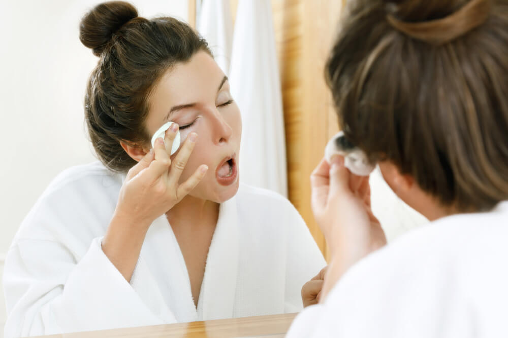 Woman removing mascara