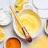 Turmeric face mask ingredients in bowls - skin care trends