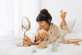 Woman following winter skin glow tips