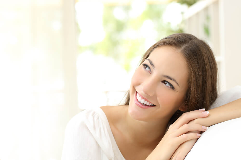 Woman smiling with white teeth