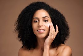 woman applying night cream