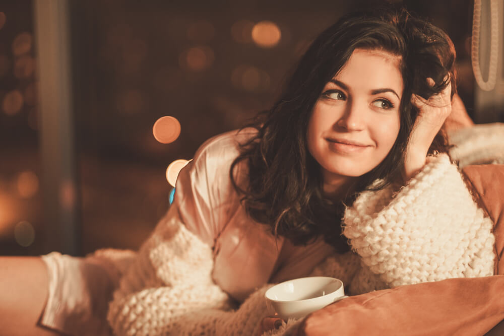 cozy woman smiling