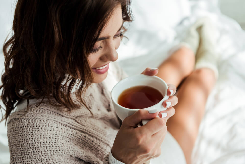 woman sipping tea