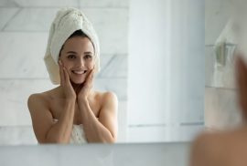 Woman smiling in mirror