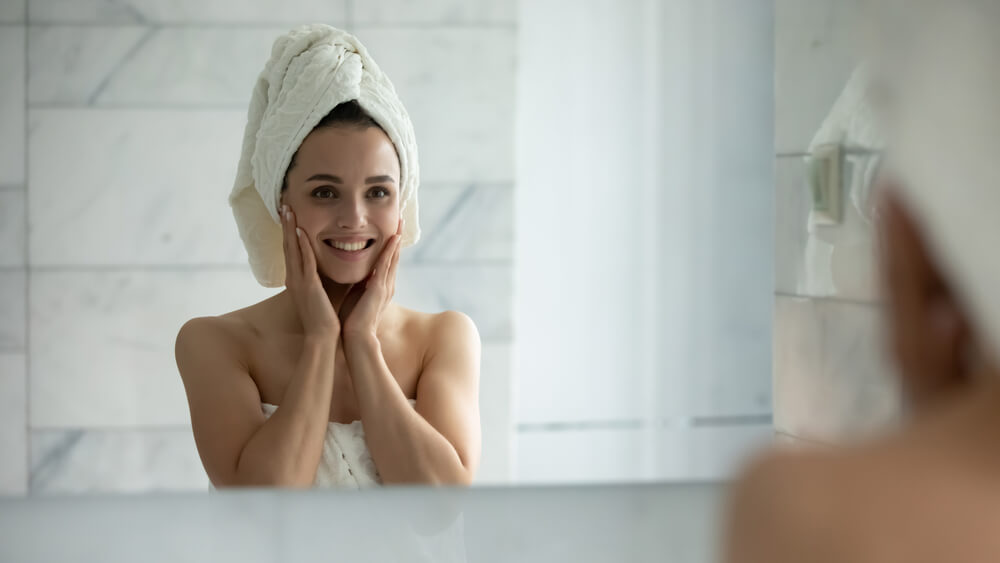 Woman smiling in mirror