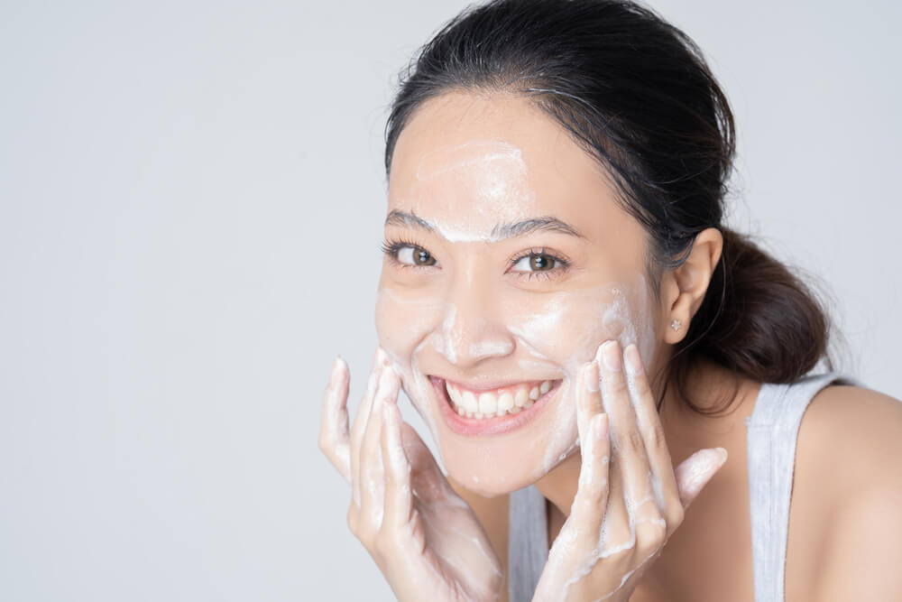 woman washing face